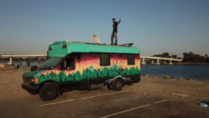 standing on roof of skoolie